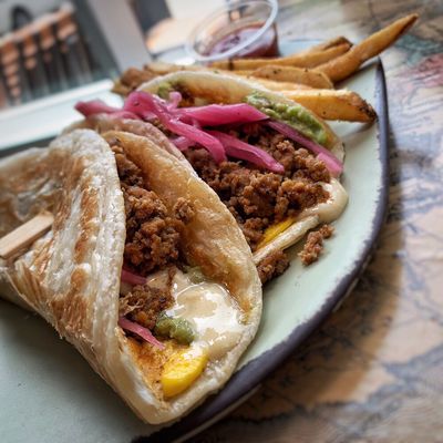 Roam by San Chez signature dishes Paratha TacosMojo ChickenElote Salad